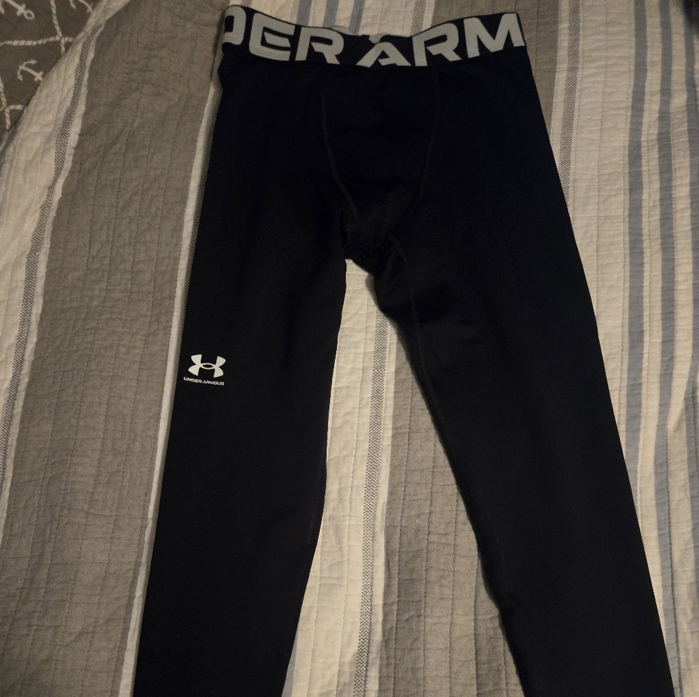 UA cold gear black tights. Youth medium. Gently used.